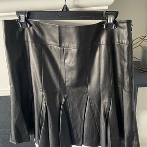 Ann Taylor vegan leather skirt with pleats.